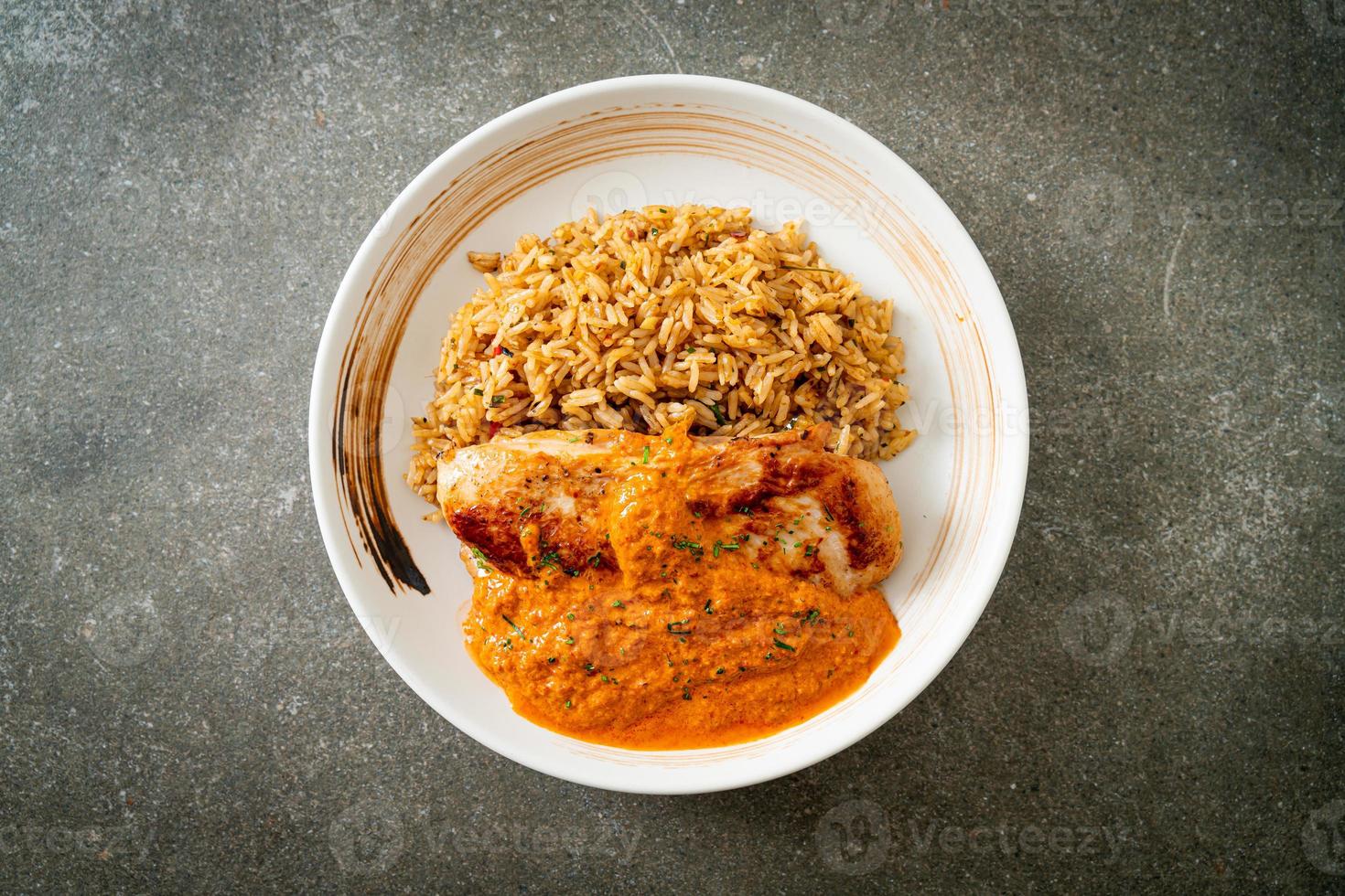 grilled chicken steak with red curry sauce and rice photo
