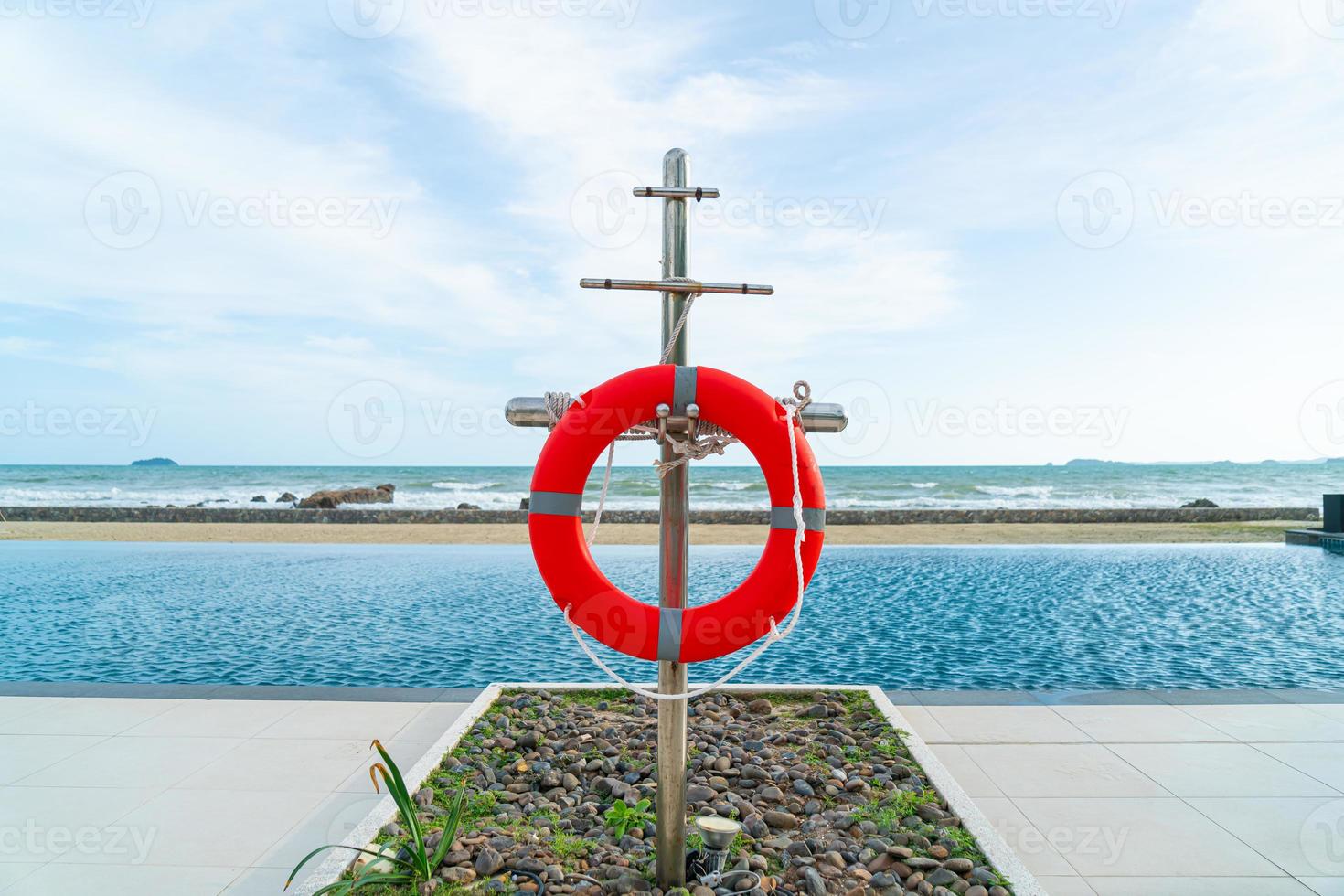 lifebuoy ring near swimming pool photo