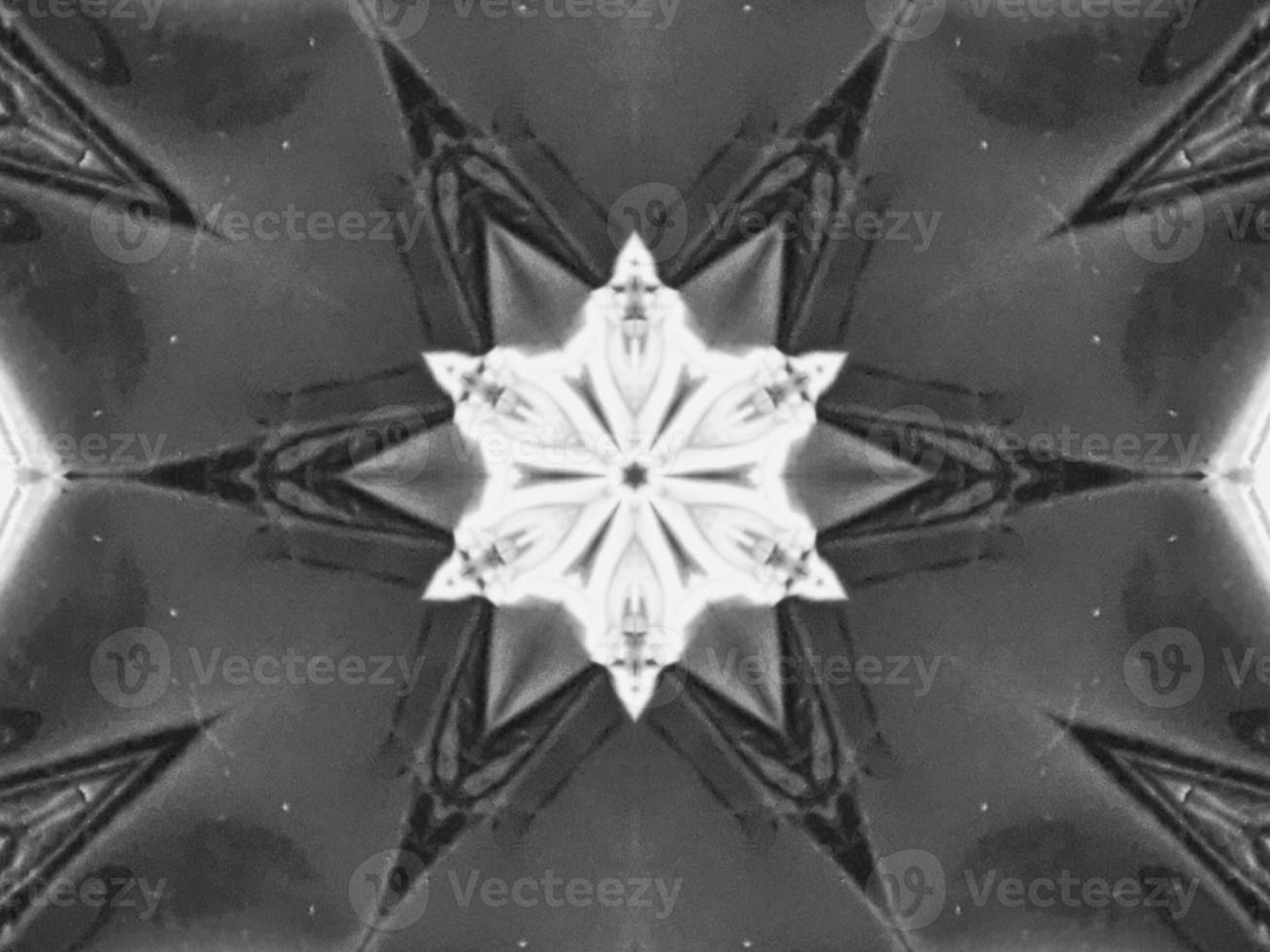 Black silver metalic kaleidoscope background. Abstract and symmetric pattern with dark vibes. photo