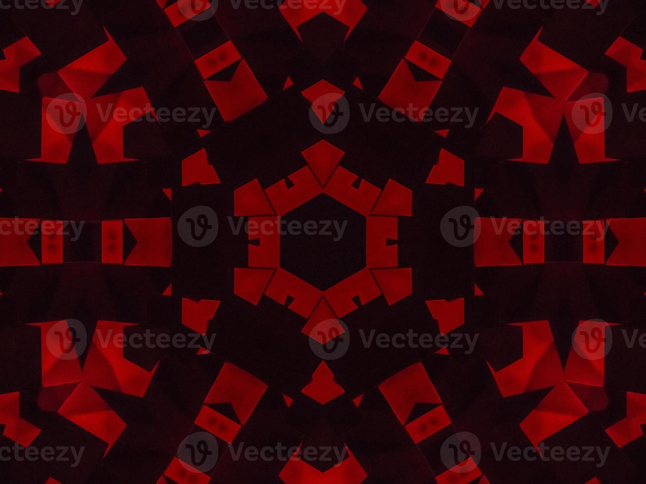 Dark red metallic kaleidoscope background. Abstract and symmetric pattern with horor vibes photo