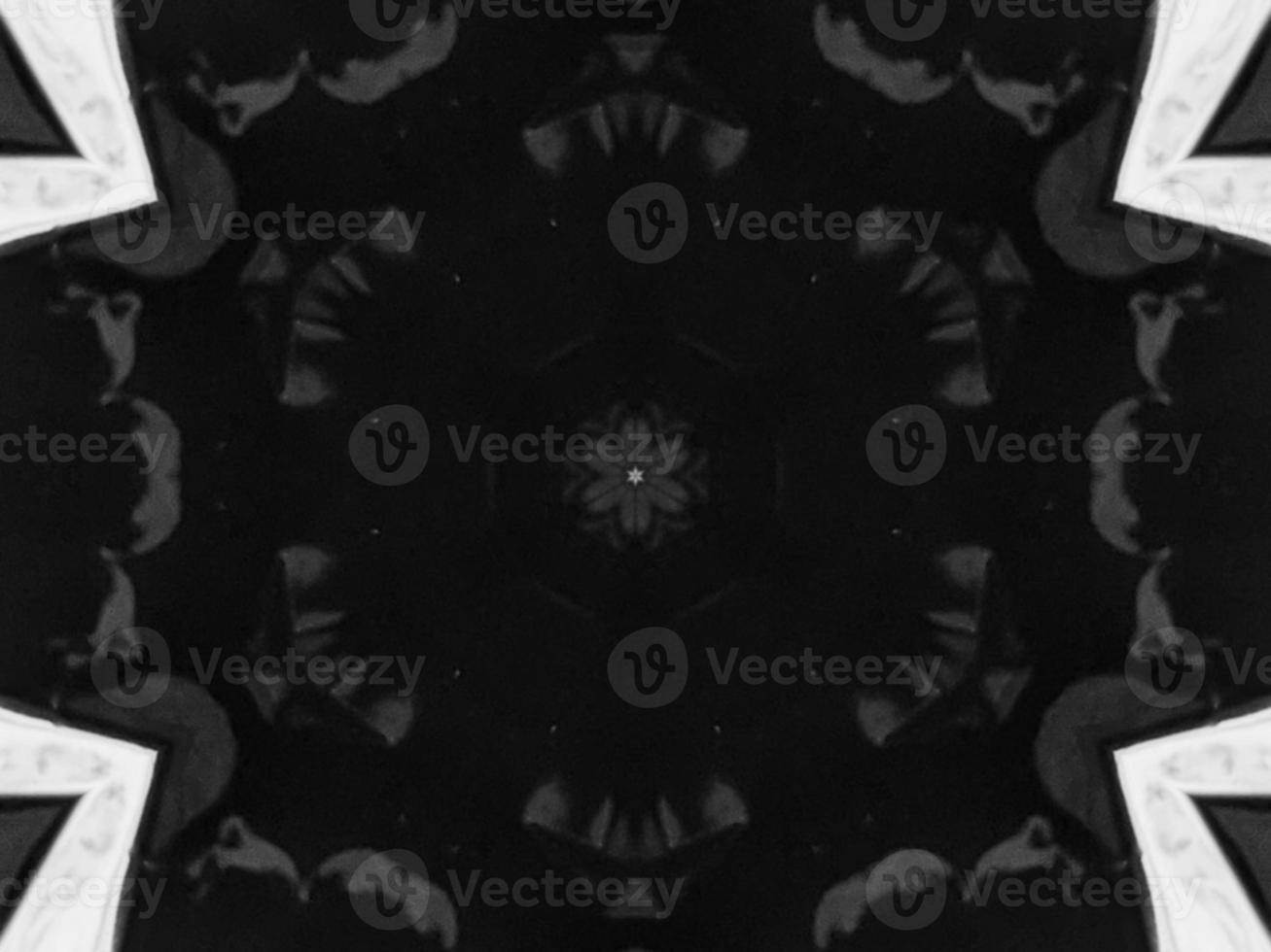 Black silver metalic kaleidoscope background. Abstract and symmetric pattern with dark vibes. photo