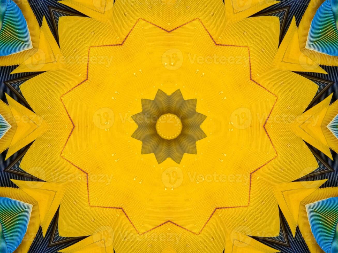 Yellow feather kaleidoscope floral pattern with some blue and red color. Abstract unique and aesthetic background. photo