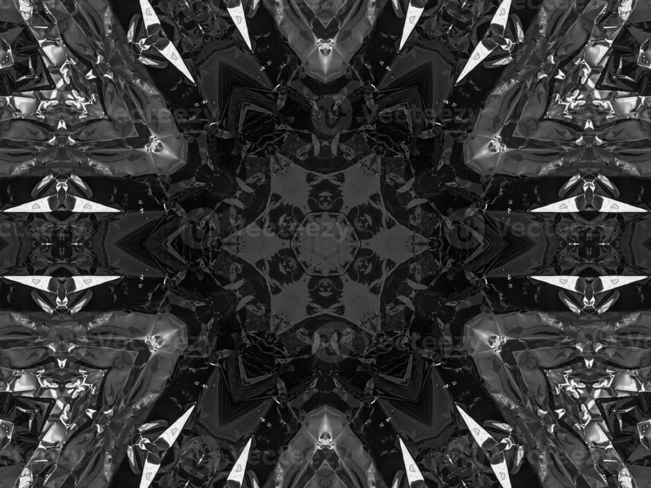 Black silver metalic kaleidoscope background. Abstract and symmetric pattern with dark vibes. photo