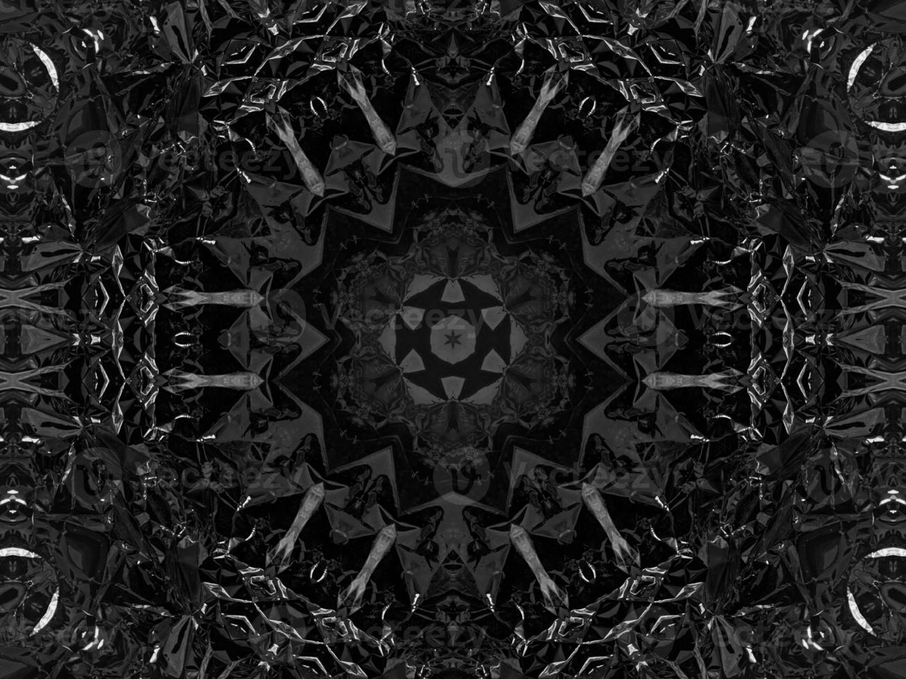 Black silver metalic kaleidoscope background. Abstract and symmetric pattern with dark vibes. photo
