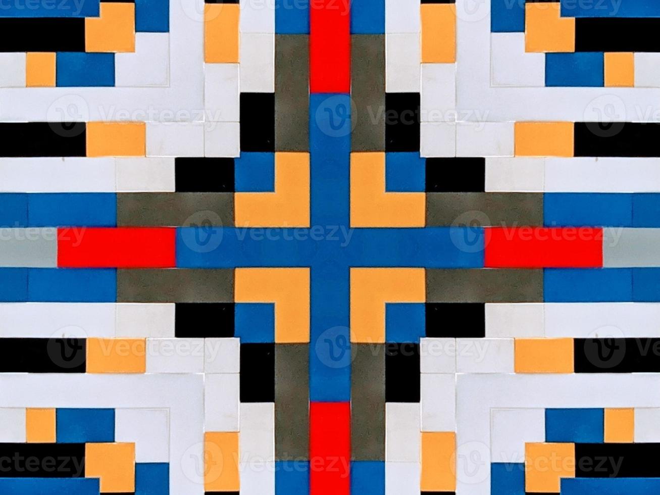 A colorful brick kaleidoscope background. Symmetric abstract and aesthetic pattern photo