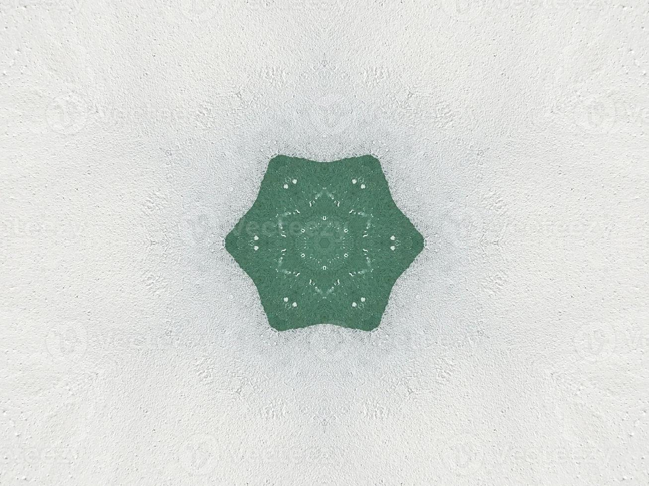 Green watercolor on the wall kaleidoscope background with abstract and unique pattern photo