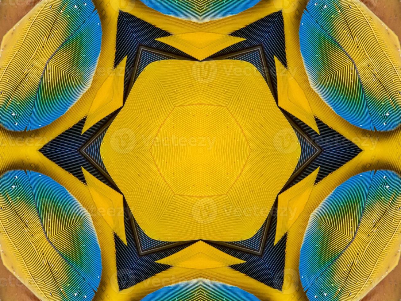 Yellow feather kaleidoscope floral pattern with some blue and red color. Abstract unique and aesthetic background. photo