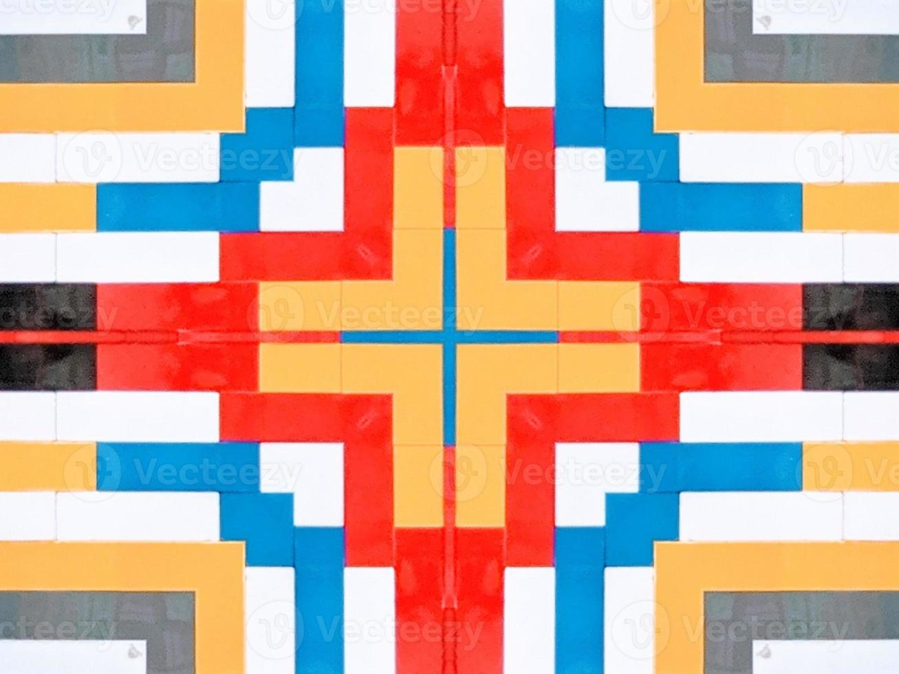 A colorful brick kaleidoscope background. Symmetric abstract and aesthetic pattern photo