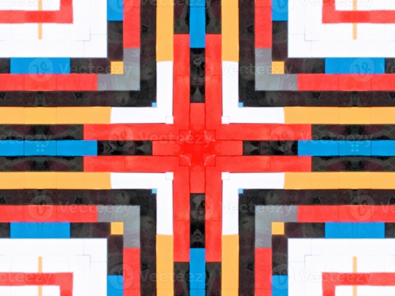 A colorful brick kaleidoscope background. Symmetric abstract and aesthetic pattern photo