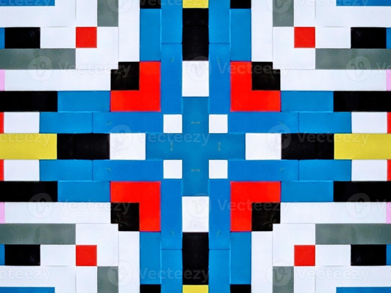 A colorful brick kaleidoscope background. Symmetric abstract and aesthetic pattern photo