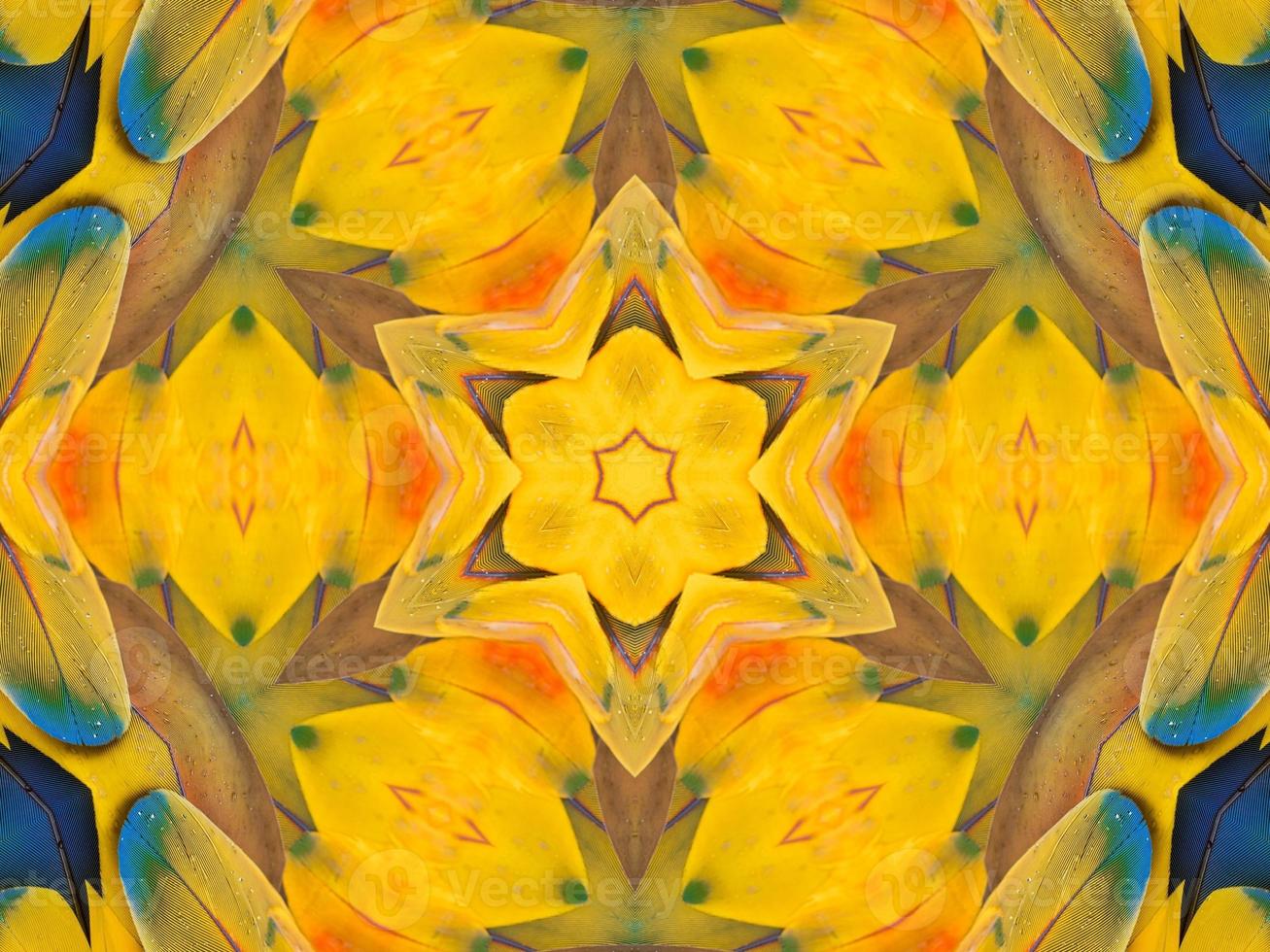 Yellow feather kaleidoscope floral pattern with some blue and red color. Abstract unique and aesthetic background. photo