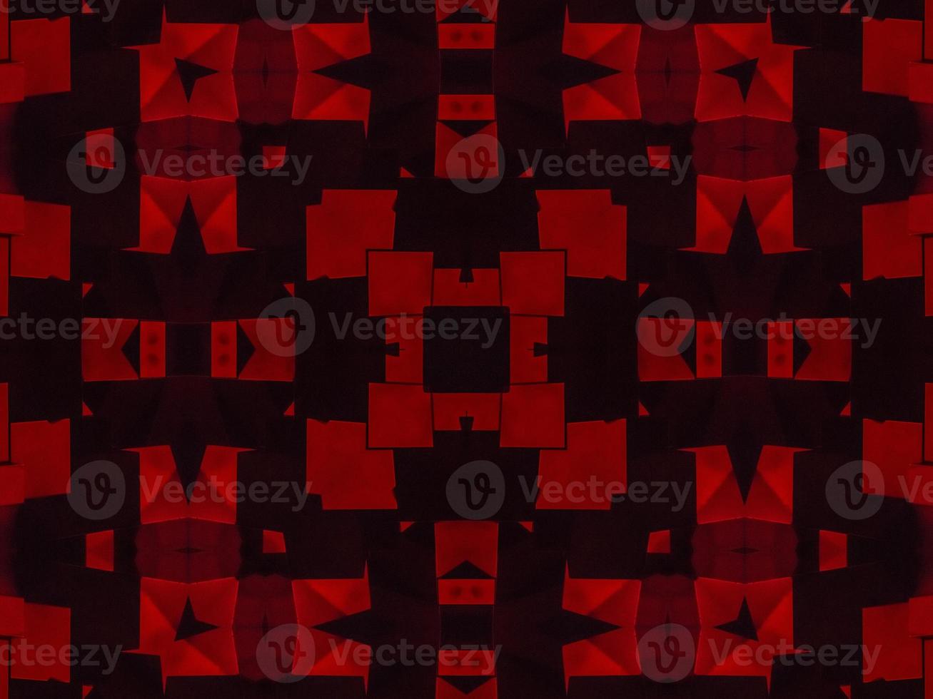 Dark red metallic kaleidoscope background. Abstract and symmetric pattern with horor vibes photo