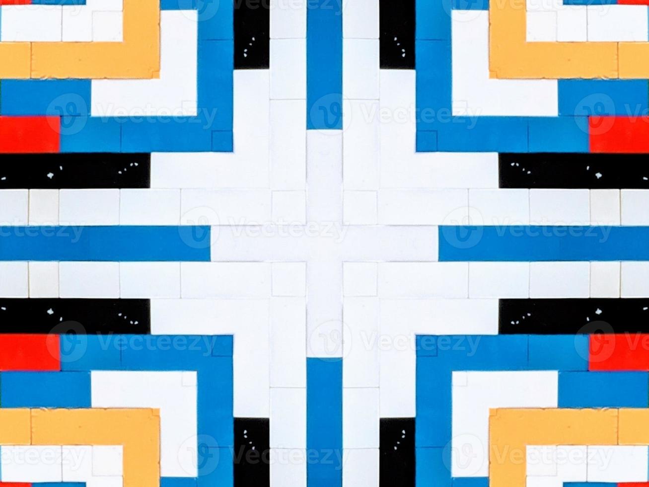 A colorful brick kaleidoscope background. Symmetric abstract and aesthetic pattern photo