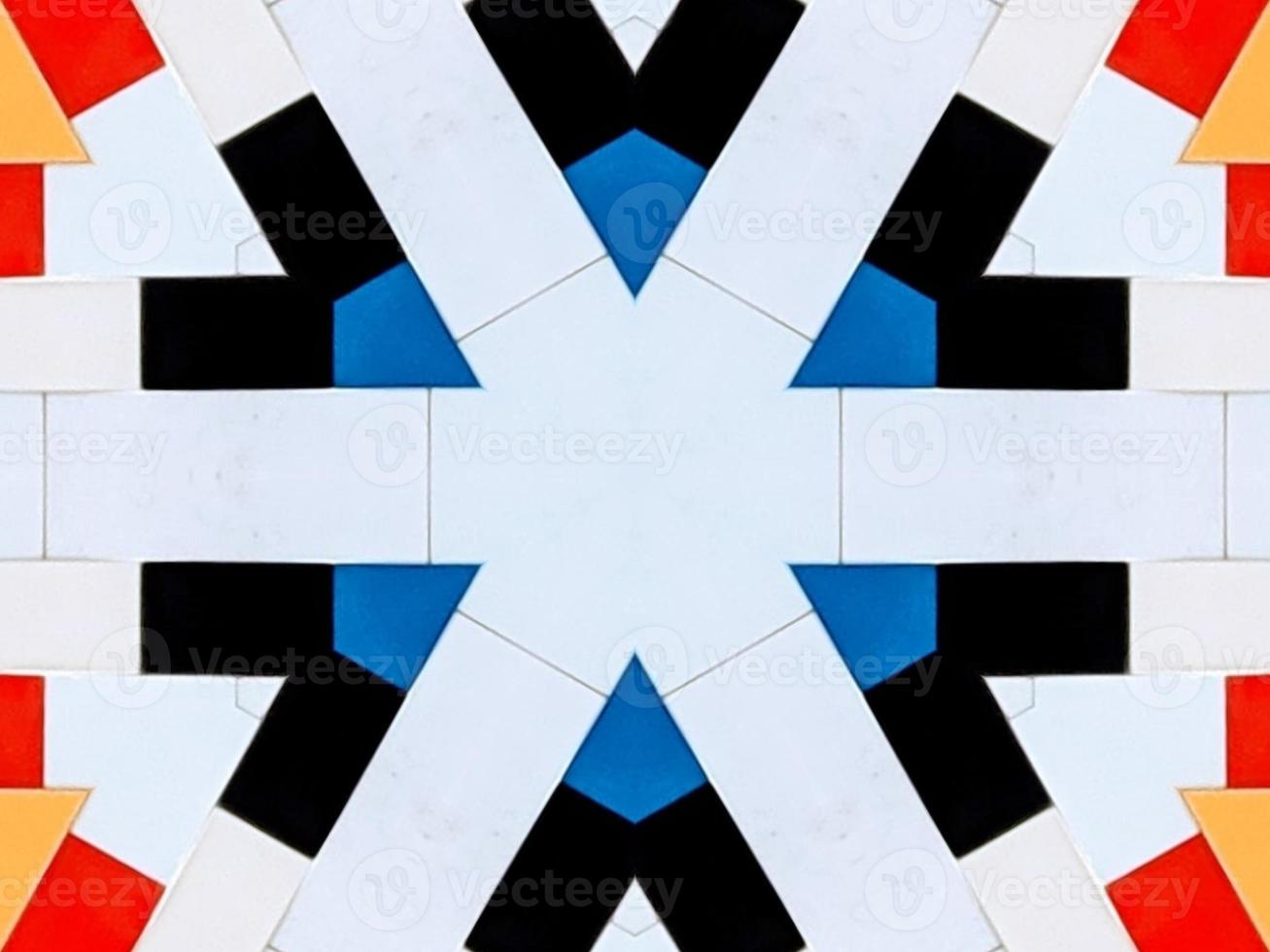 A colorful brick kaleidoscope background. Symmetric abstract and aesthetic pattern photo