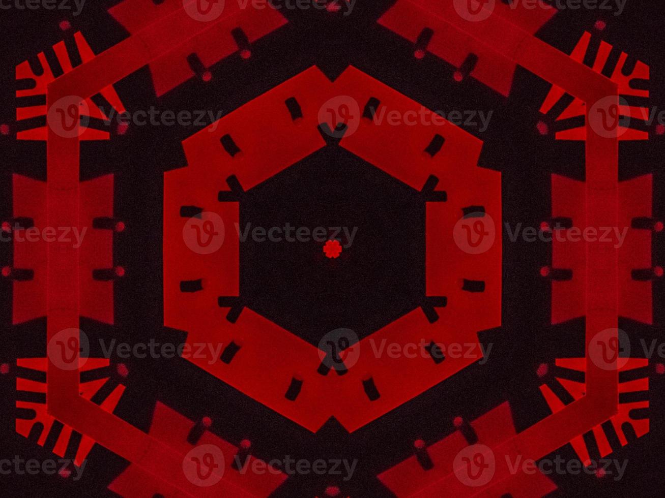 Dark red metallic kaleidoscope background. Abstract and symmetric pattern with horor vibes photo