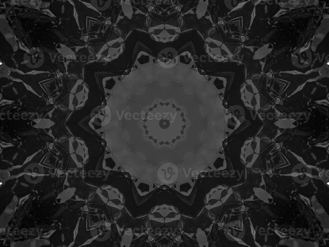 Black silver metalic kaleidoscope background. Abstract and symmetric pattern with dark vibes. photo