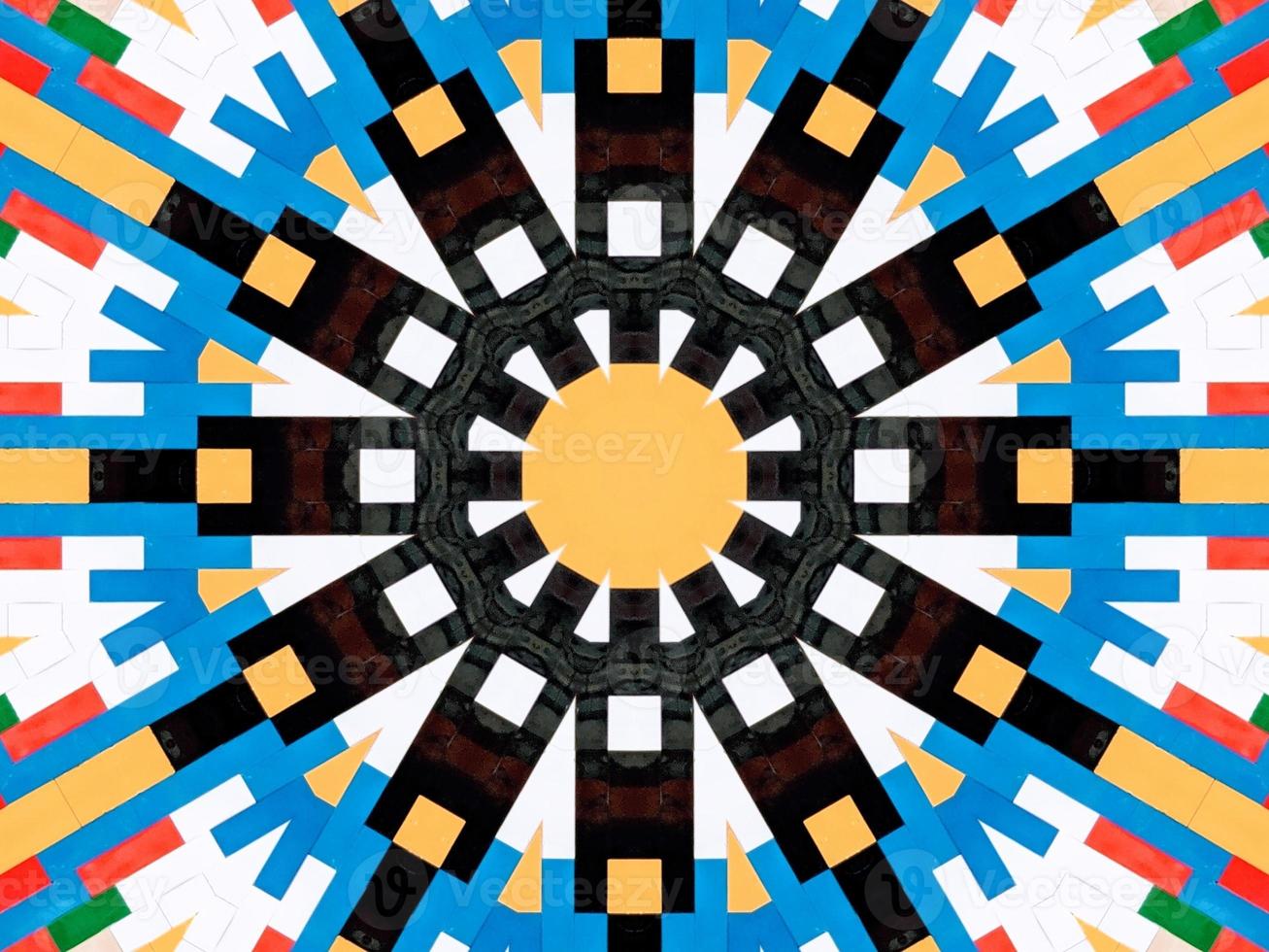 A colorful brick kaleidoscope background. Symmetric abstract and aesthetic pattern photo