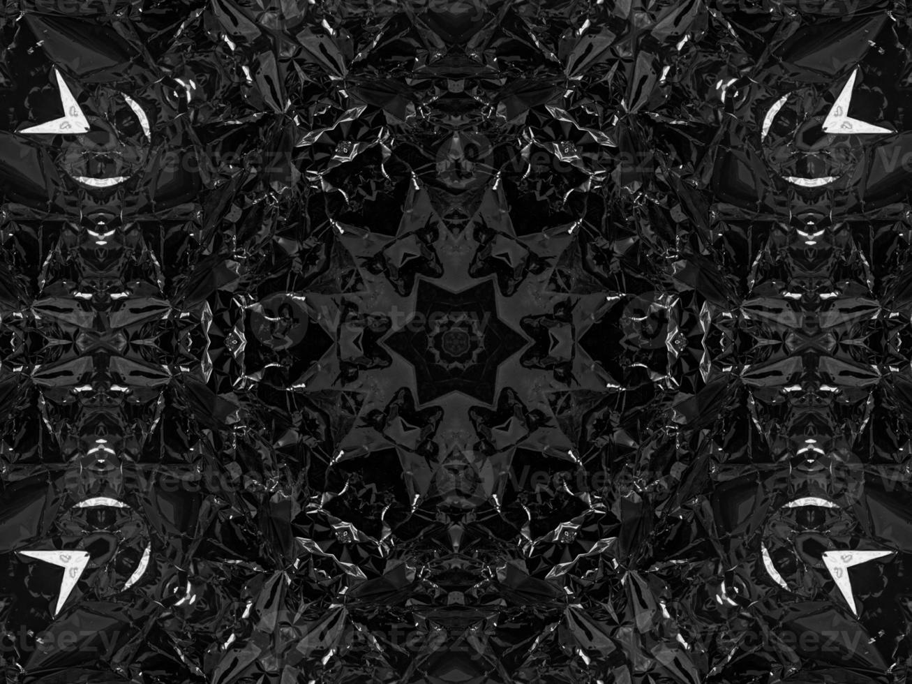 Black silver metalic kaleidoscope background. Abstract and symmetric pattern with dark vibes. photo