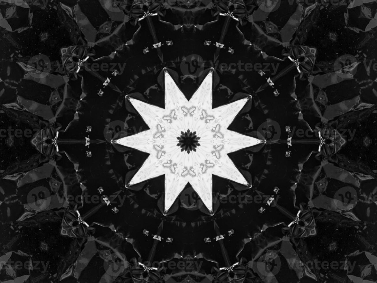 Black silver metalic kaleidoscope background. Abstract and symmetric pattern with dark vibes. photo