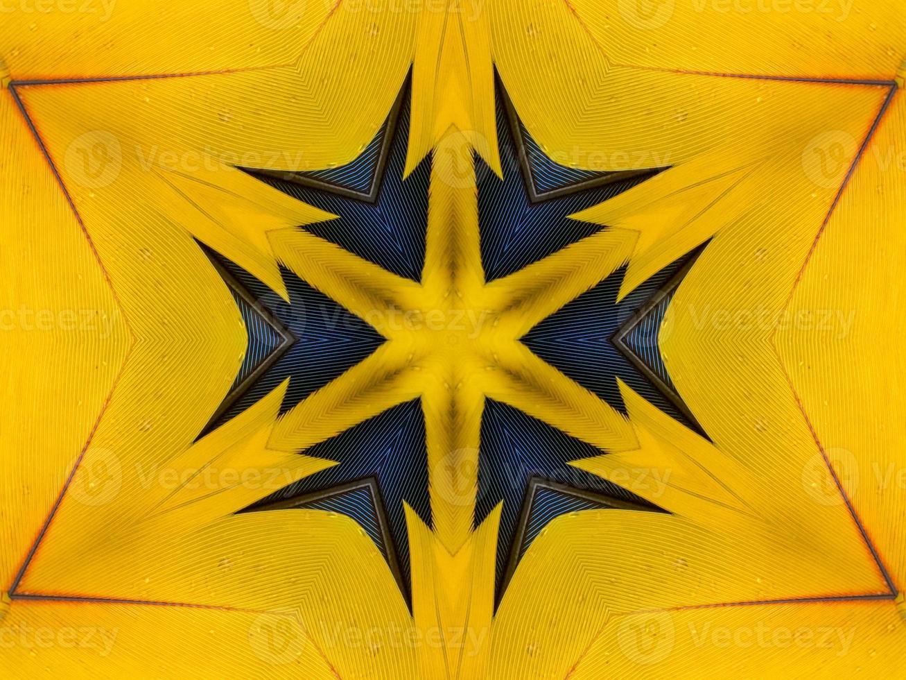Yellow feather kaleidoscope floral pattern with some blue and red color. Abstract unique and aesthetic background. photo