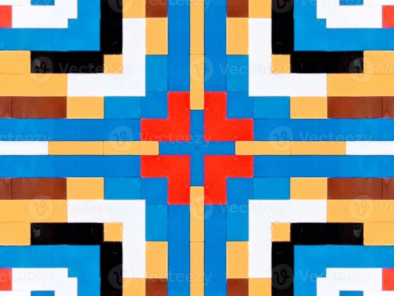 A colorful brick kaleidoscope background. Symmetric abstract and aesthetic pattern photo