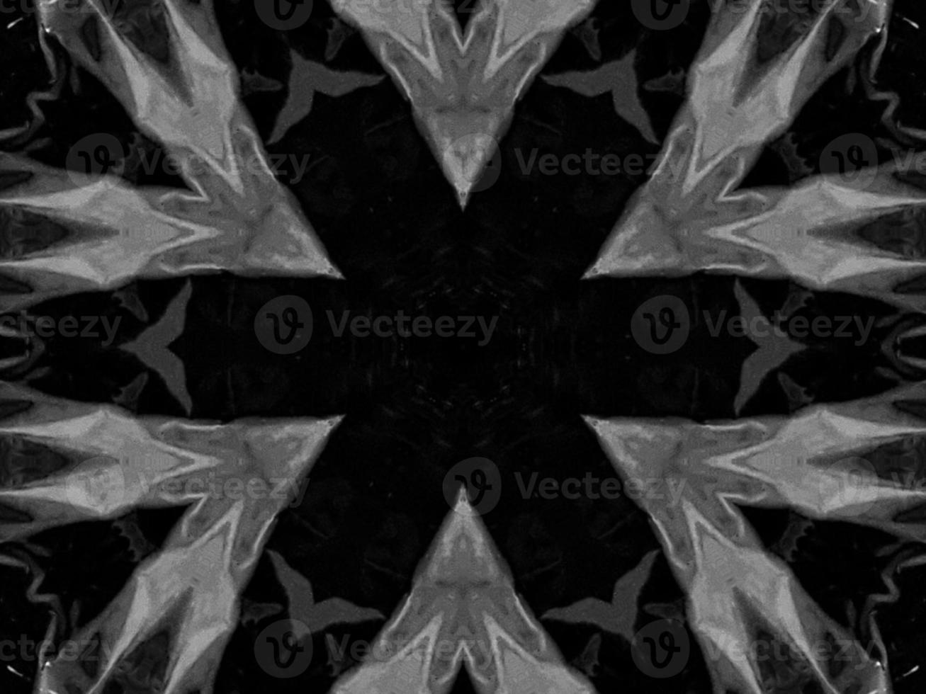 Black silver metalic kaleidoscope background. Abstract and symmetric pattern with dark vibes. photo