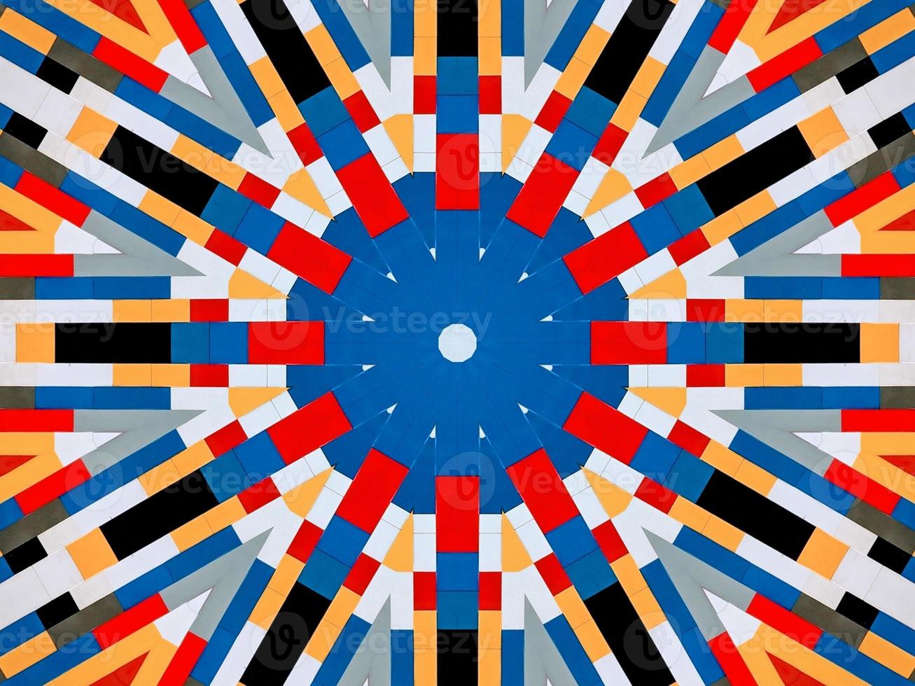 A colorful brick kaleidoscope background. Symmetric abstract and aesthetic pattern photo