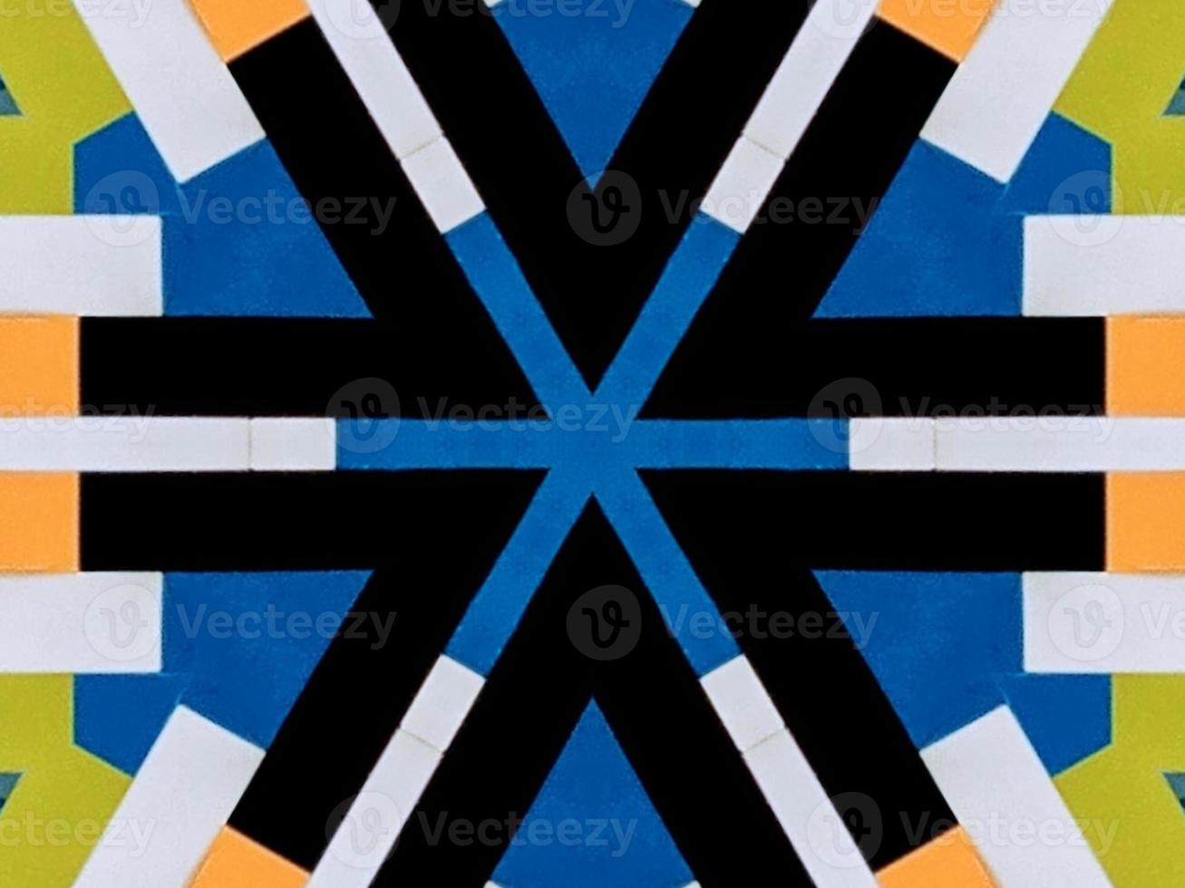 A colorful brick kaleidoscope background. Symmetric abstract and aesthetic pattern photo