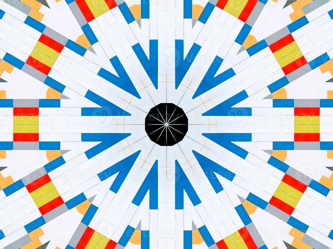 A colorful brick kaleidoscope background. Symmetric abstract and aesthetic pattern photo