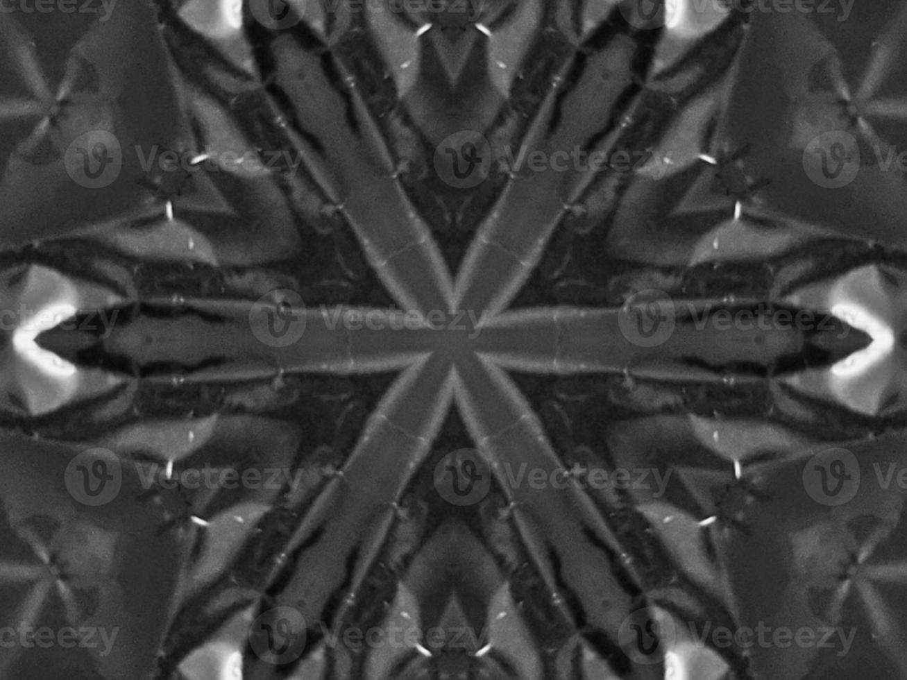 Black silver metalic kaleidoscope background. Abstract and symmetric pattern with dark vibes. photo