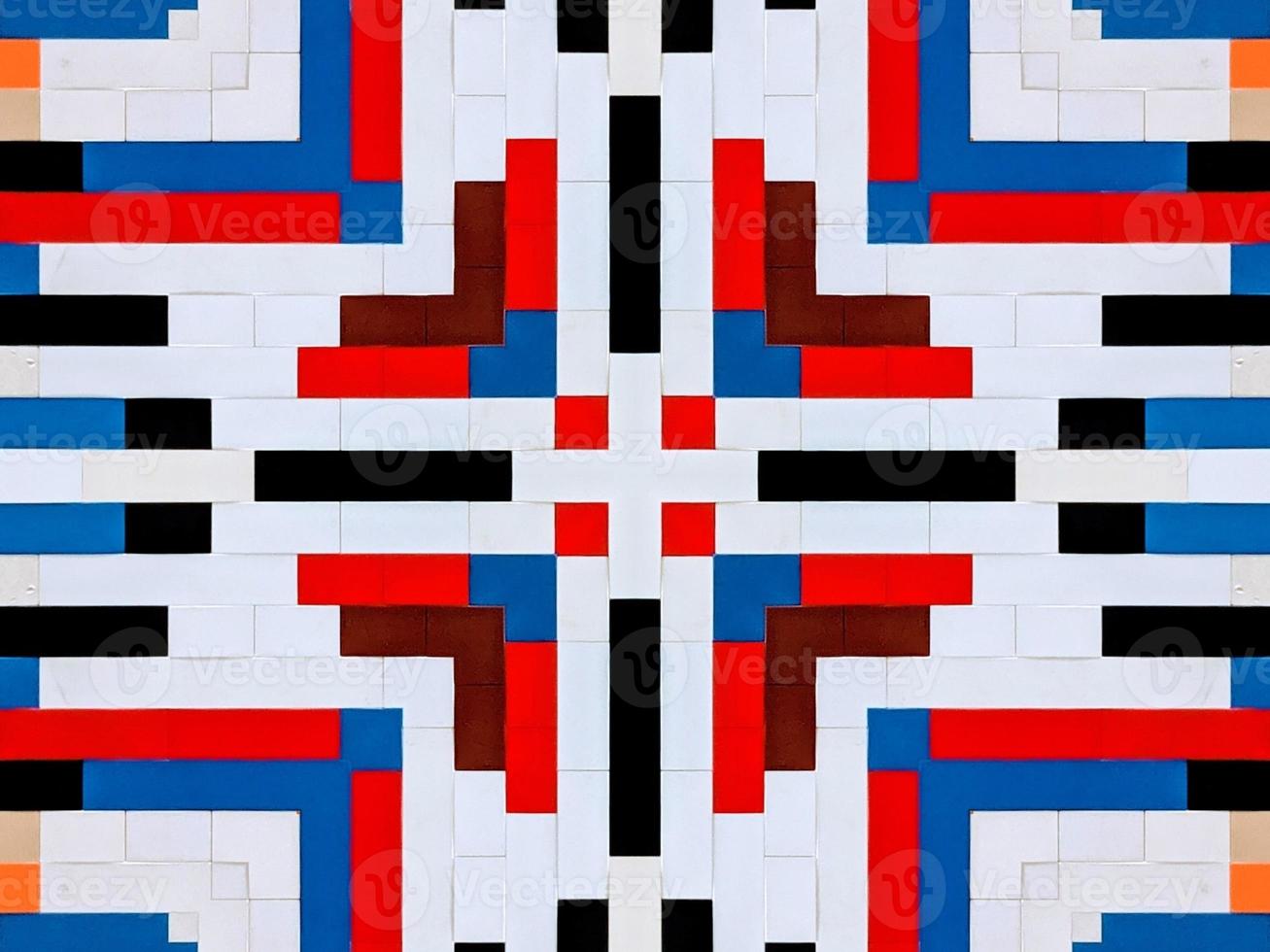 A colorful brick kaleidoscope background. Symmetric abstract and aesthetic pattern photo