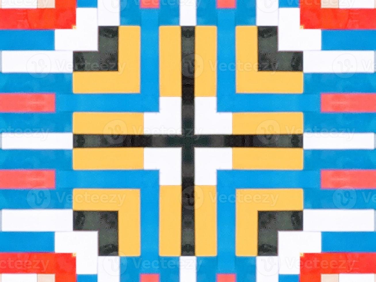 A colorful brick kaleidoscope background. Symmetric abstract and aesthetic pattern photo