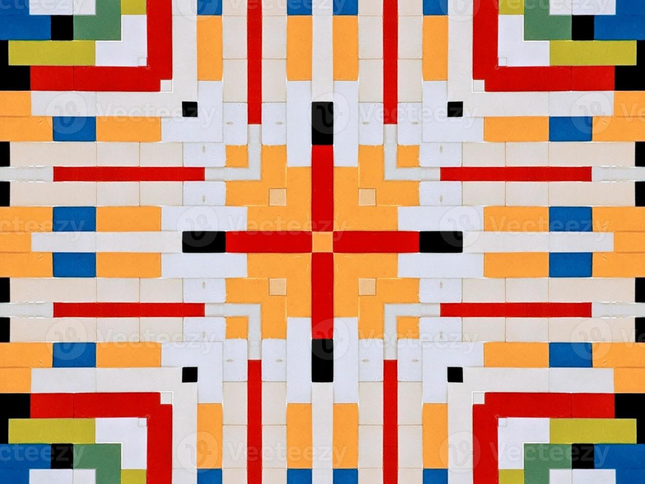 A colorful brick kaleidoscope background. Symmetric abstract and aesthetic pattern photo