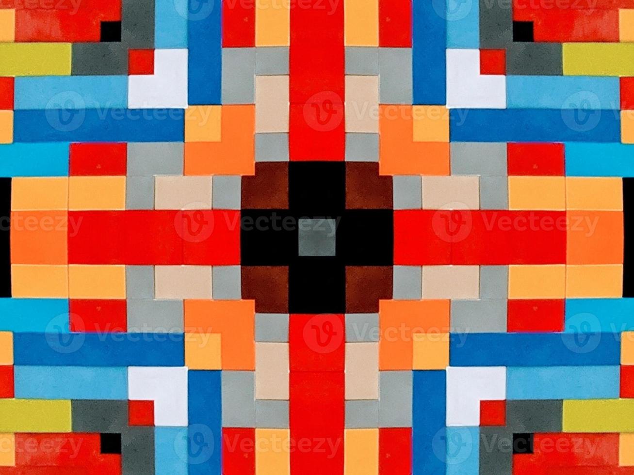 A colorful brick kaleidoscope background. Symmetric abstract and aesthetic pattern photo