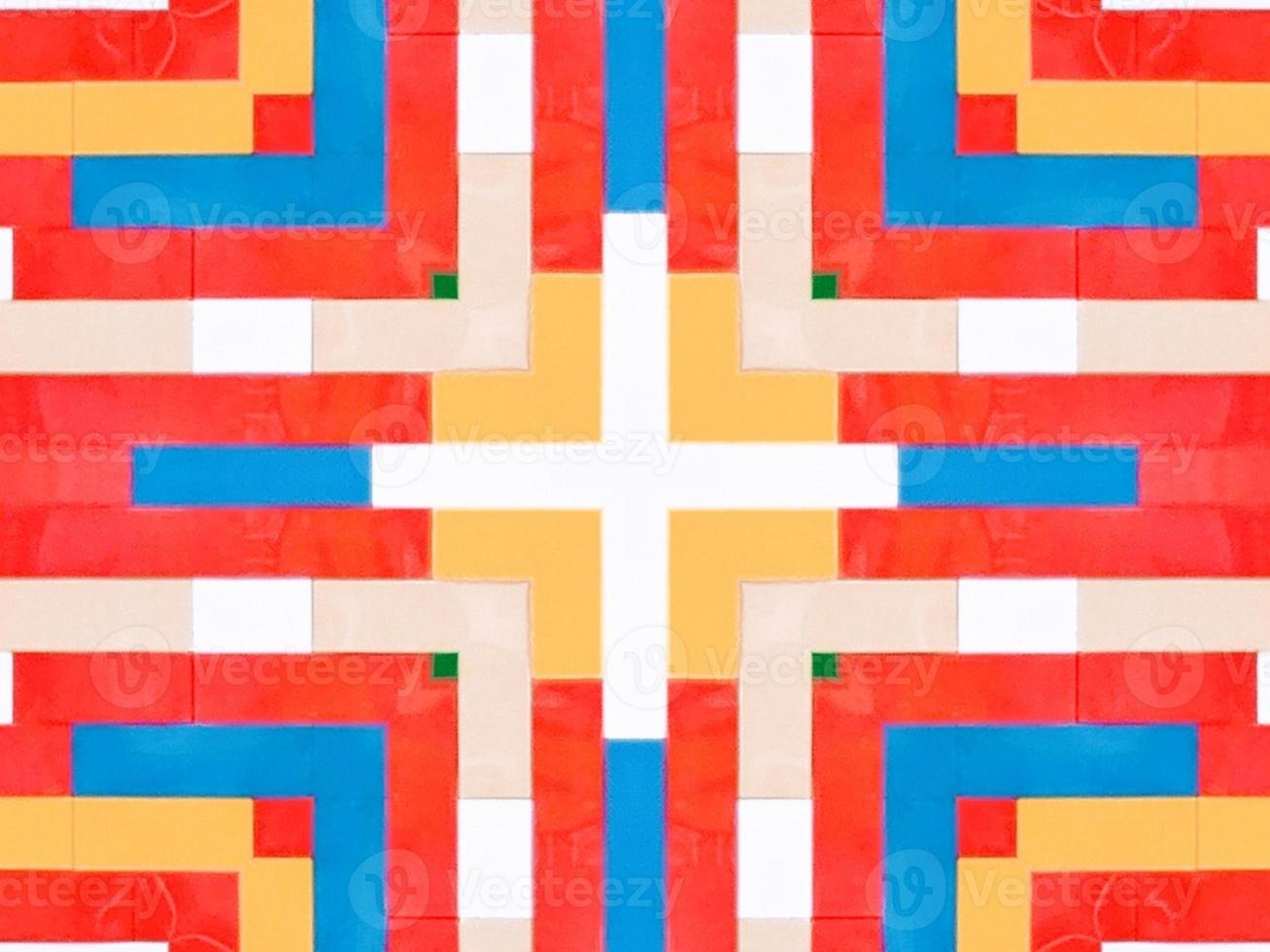 A colorful brick kaleidoscope background. Symmetric abstract and aesthetic pattern photo