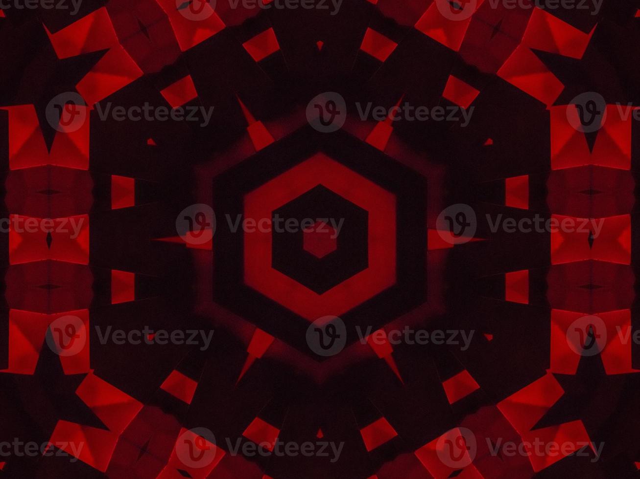Dark red metallic kaleidoscope background. Abstract and symmetric pattern with horor vibes photo