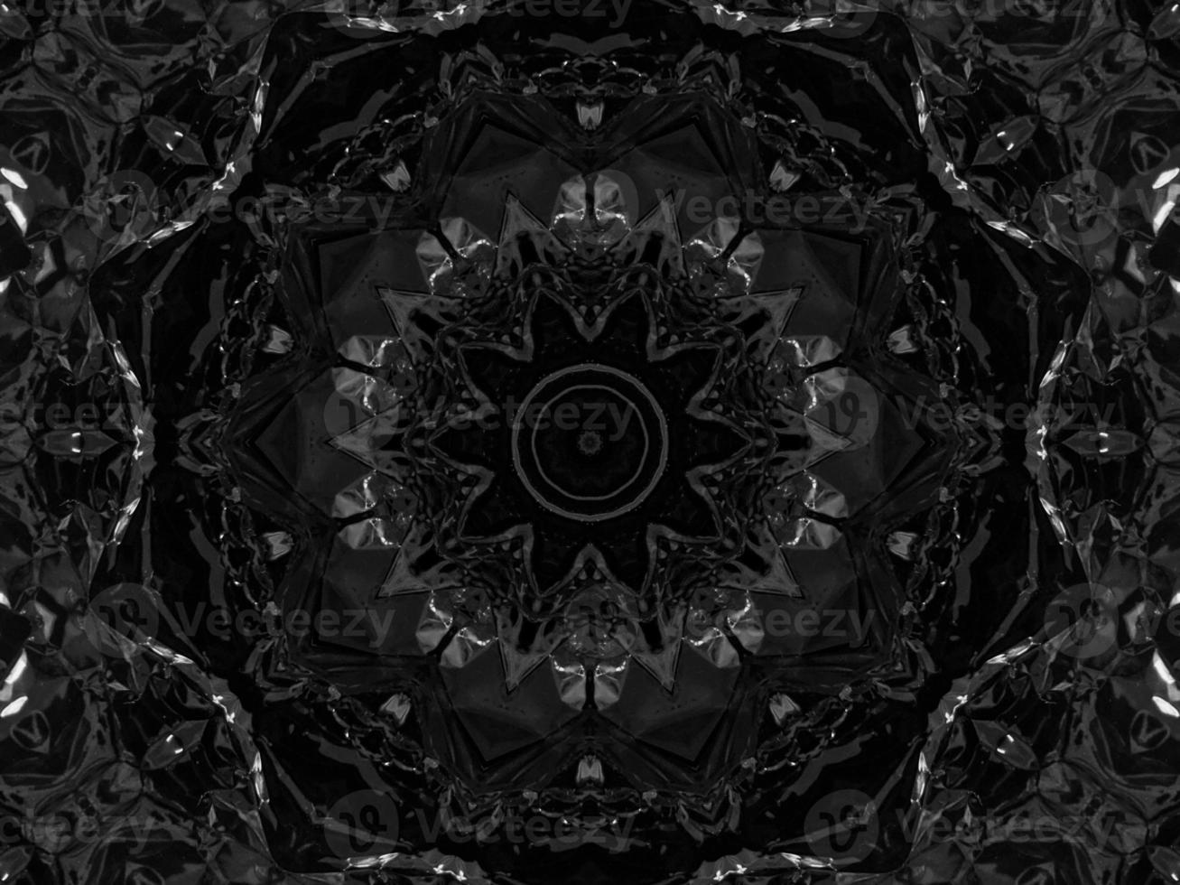 Black silver metalic kaleidoscope background. Abstract and symmetric pattern with dark vibes. photo