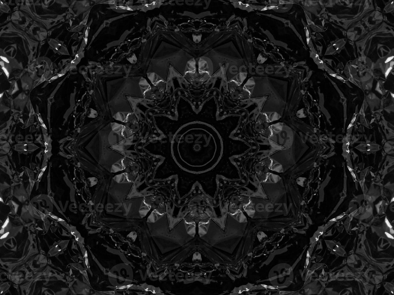 Black silver metalic kaleidoscope background. Abstract and symmetric pattern with dark vibes. photo