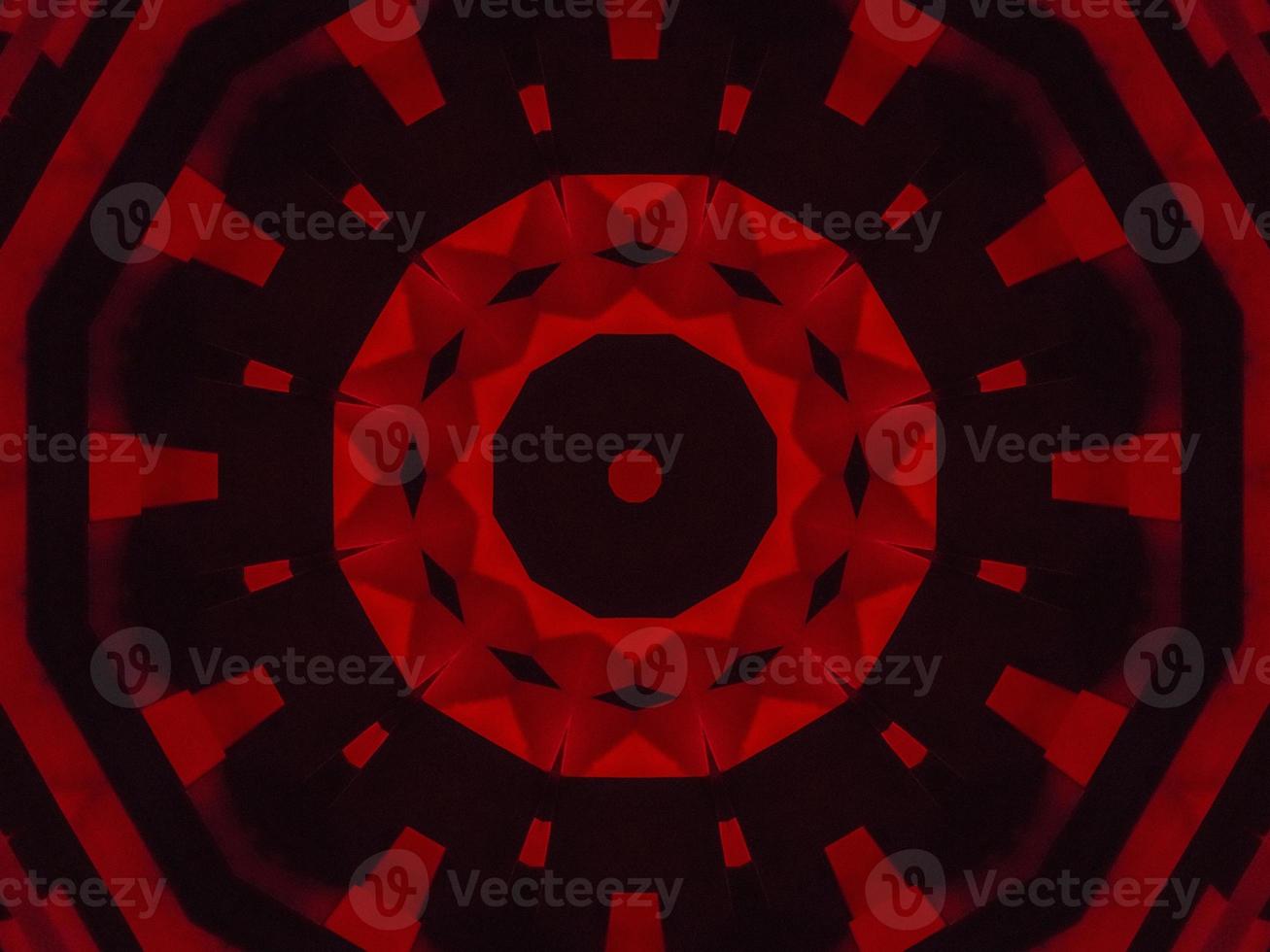 Dark red metallic kaleidoscope background. Abstract and symmetric pattern with horor vibes photo
