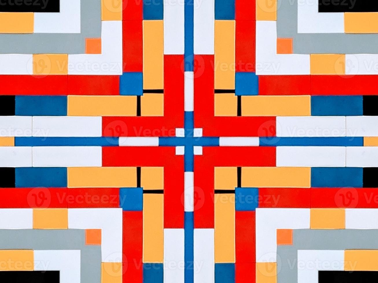 A colorful brick kaleidoscope background. Symmetric abstract and aesthetic pattern photo