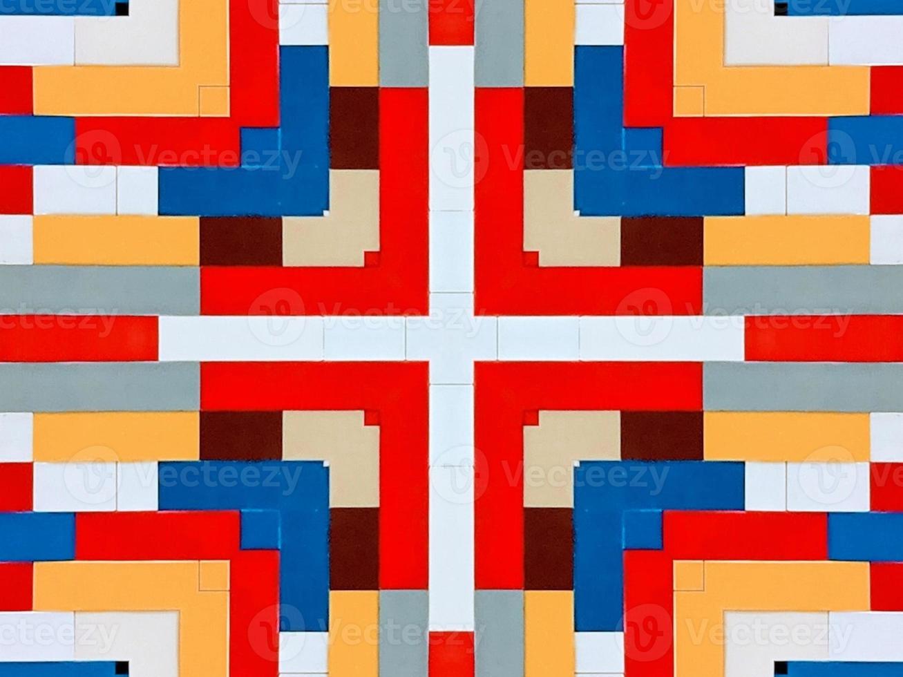 A colorful brick kaleidoscope background. Symmetric abstract and aesthetic pattern photo