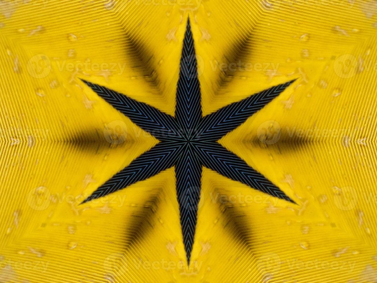 Yellow feather kaleidoscope floral pattern with some blue and red color. Abstract unique and aesthetic background. photo