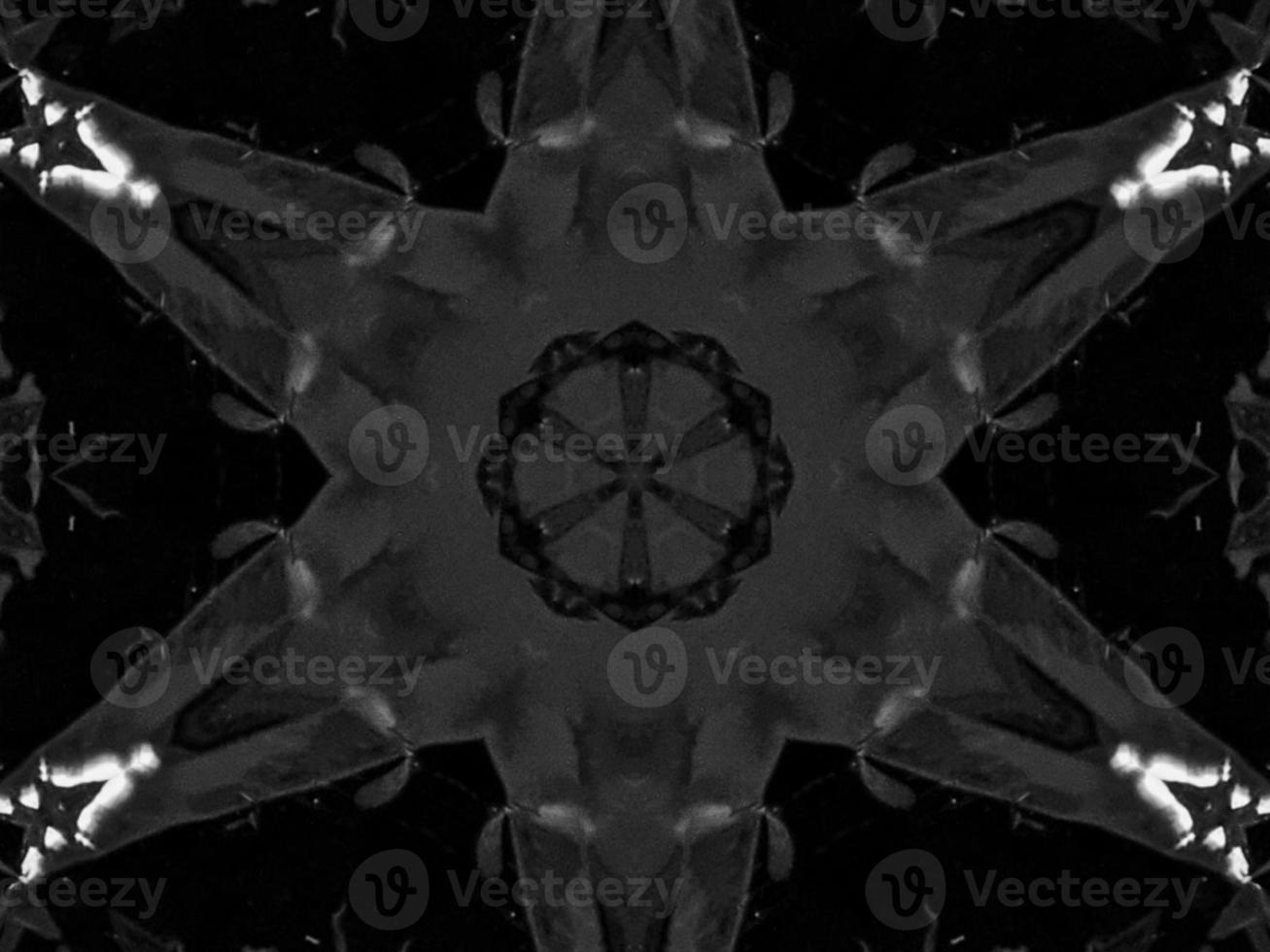 Black silver metalic kaleidoscope background. Abstract and symmetric pattern with dark vibes. photo