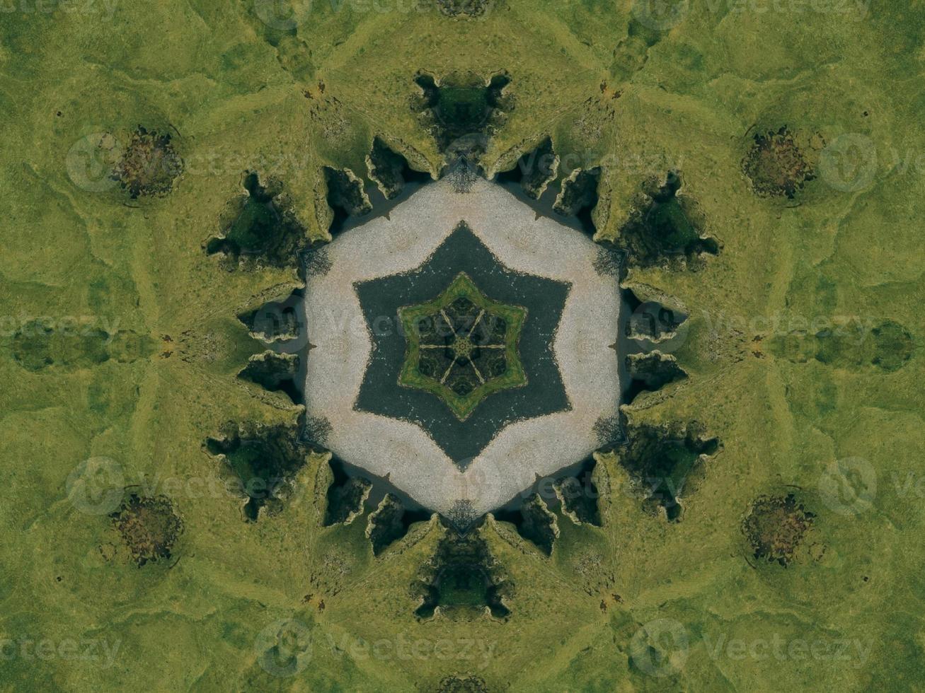 Green meadow aesthetic kaleidoscope floral pattern abstract unique texture background photo