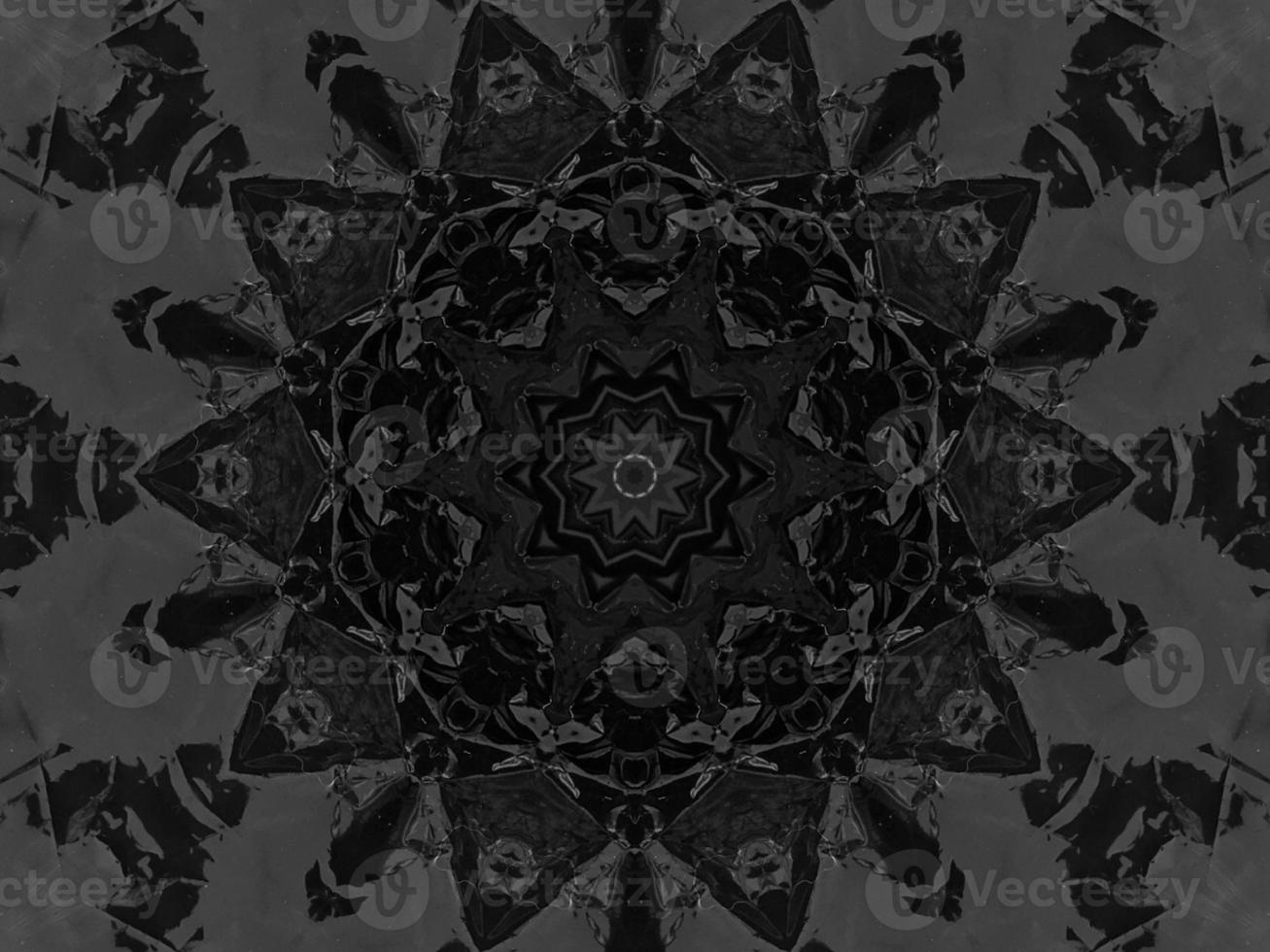 Black silver metalic kaleidoscope background. Abstract and symmetric pattern with dark vibes. photo