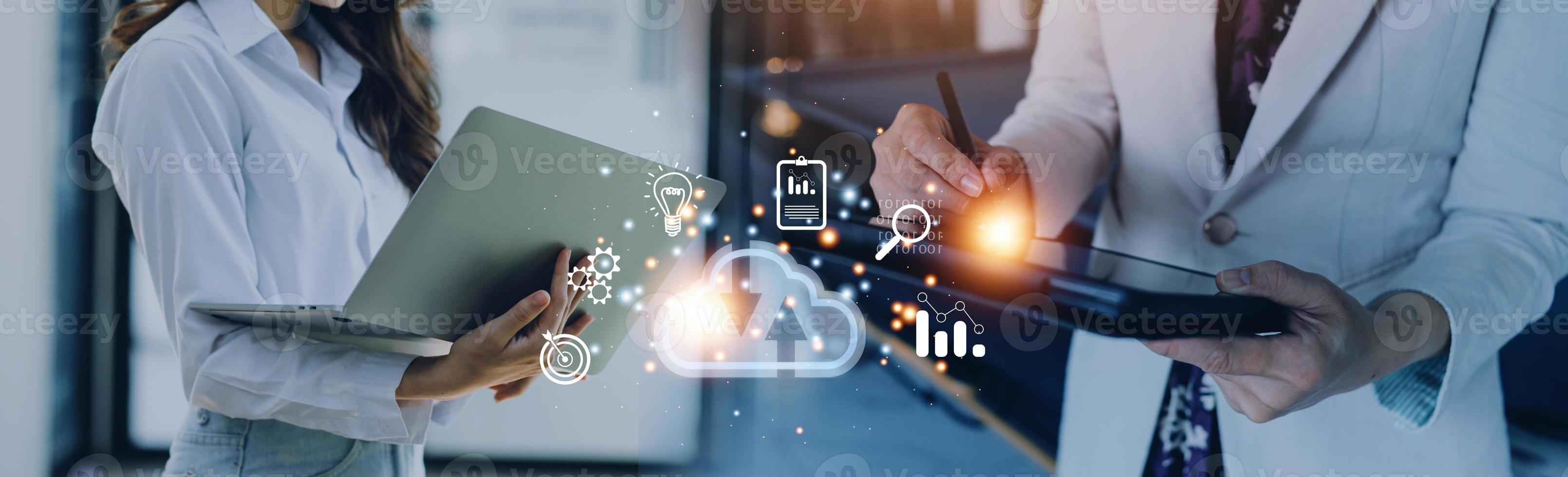 man use Laptop with cloud computing diagram show on hand. Cloud technology. Data storage. Networking and internet service concept. photo