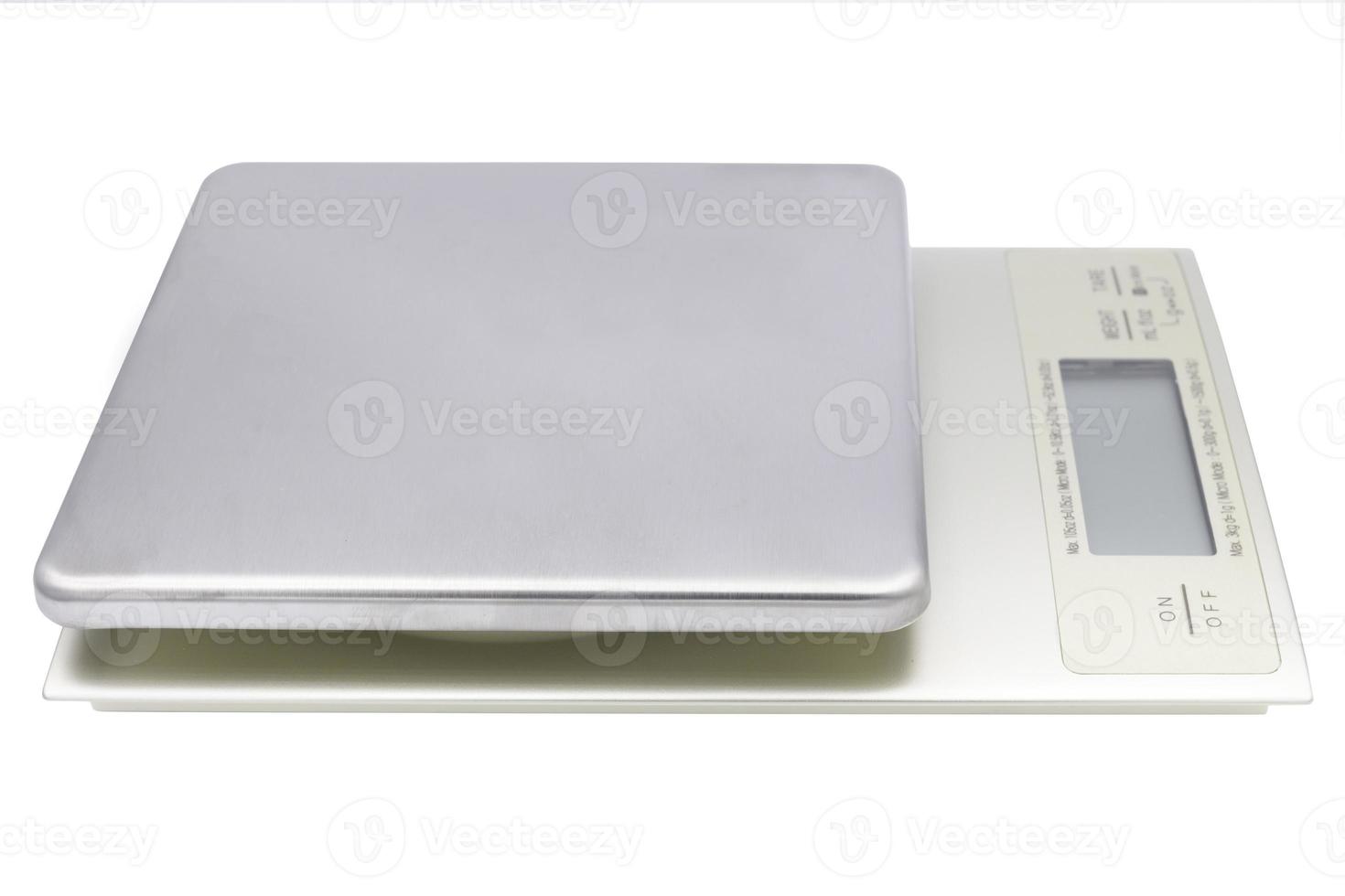 side view of digital kitchen scale isolated on white background with clipping path inside photo