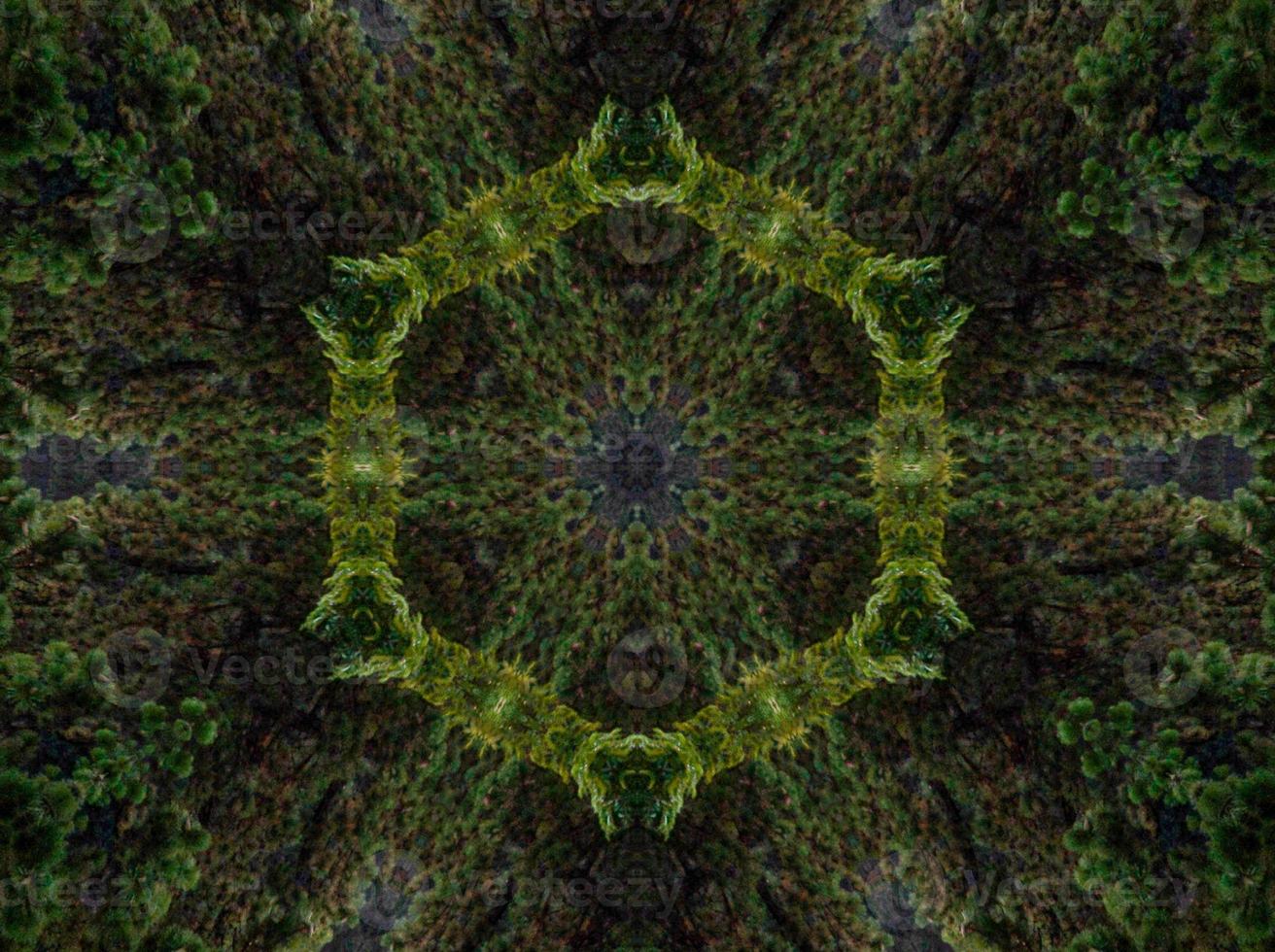 Abstract kaleidoscope background. Beautiful multicolor kaleidoscope texture. Unique kaleidoscope design. with dark green and light green base colors photo