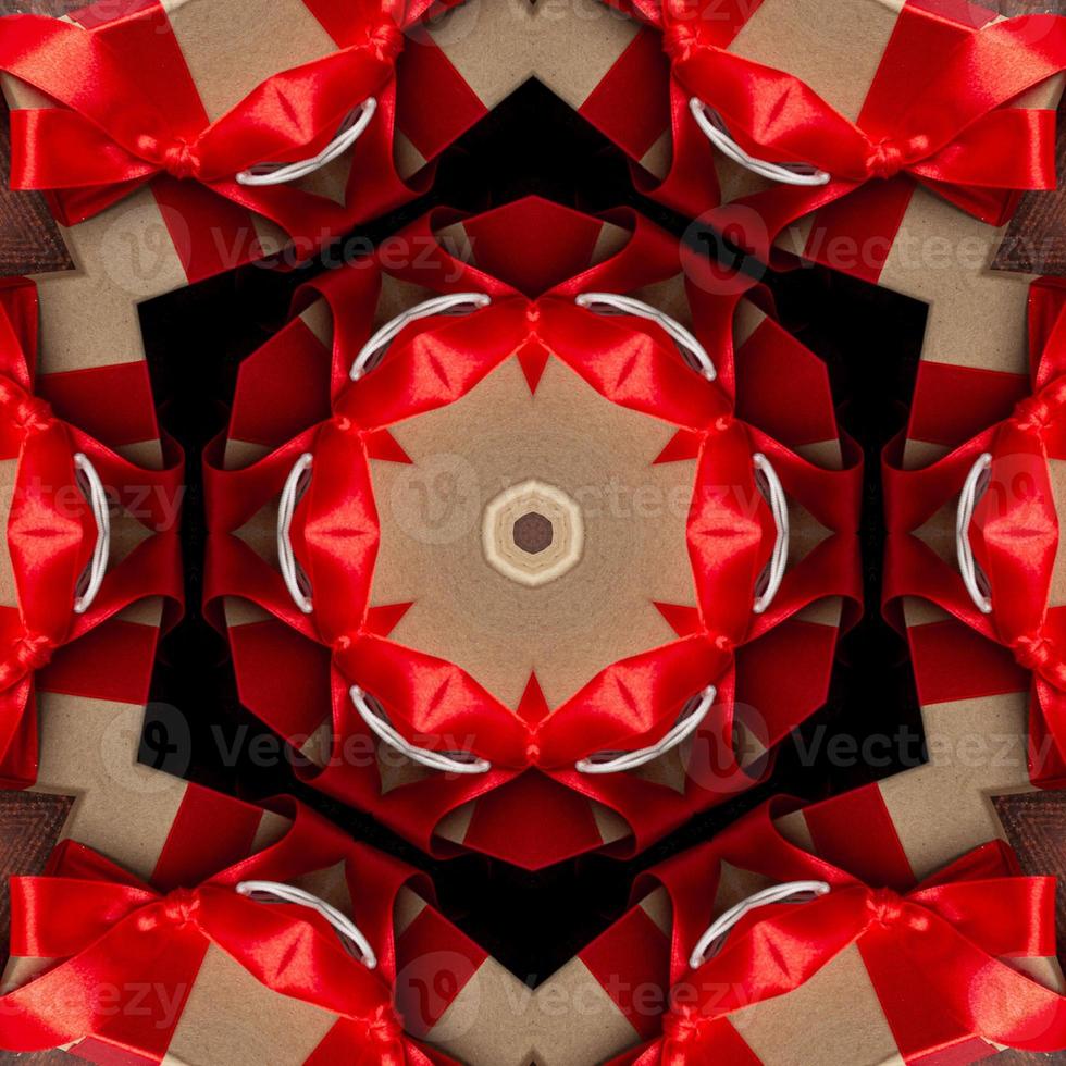 Square dimensional abstract kaleidoscope background. Beautiful multicolor kaleidoscope texture. Unique kaleidoscope design. with a base color of red and a little extra light brown photo