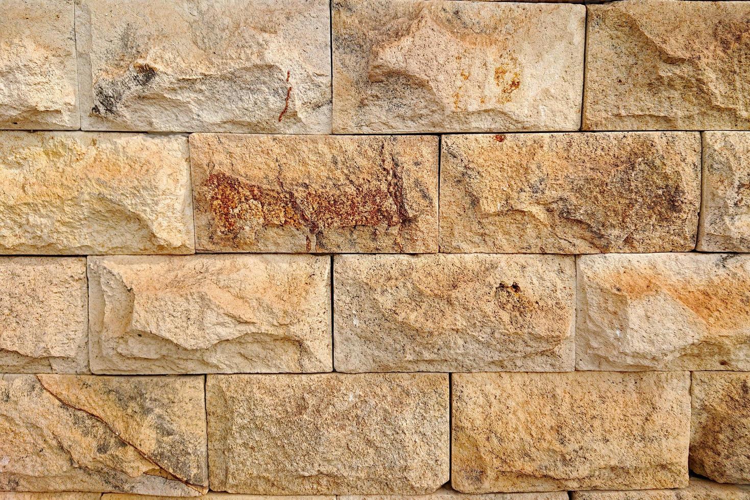 brick background for walls from natural stone photo